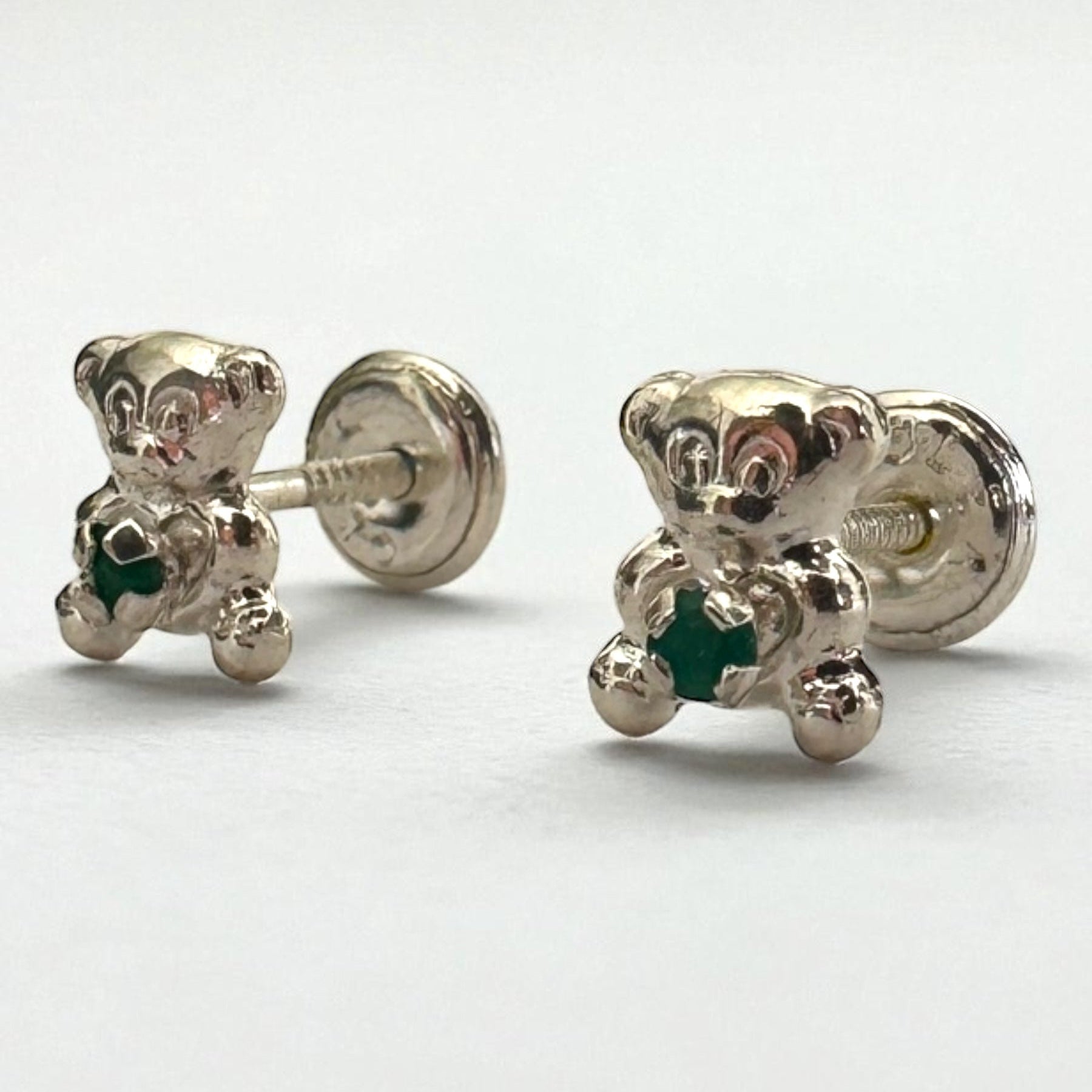 Aretes abrazo esmeralda