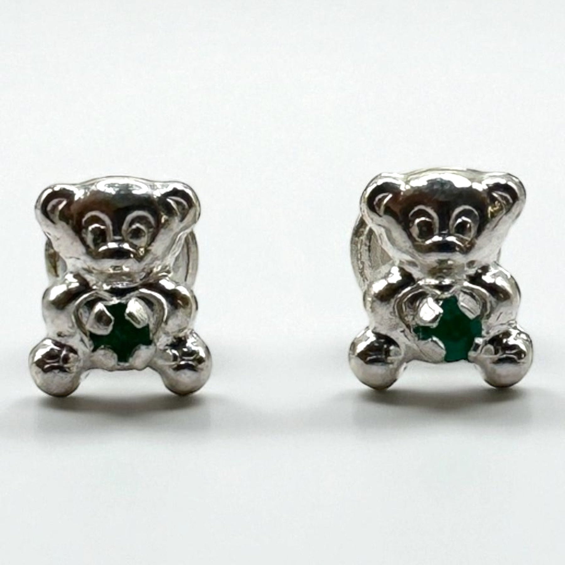 Aretes abrazo esmeralda